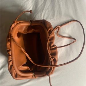 Brown leather bag. Soft oversize cluth.